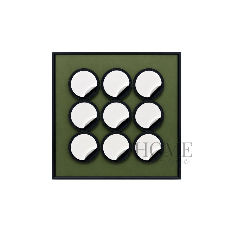 Sculpted Stillness 3D wall art with nine glossy white resin forms on black circles and an olive-green backing in a black PP frame, 50x50cm