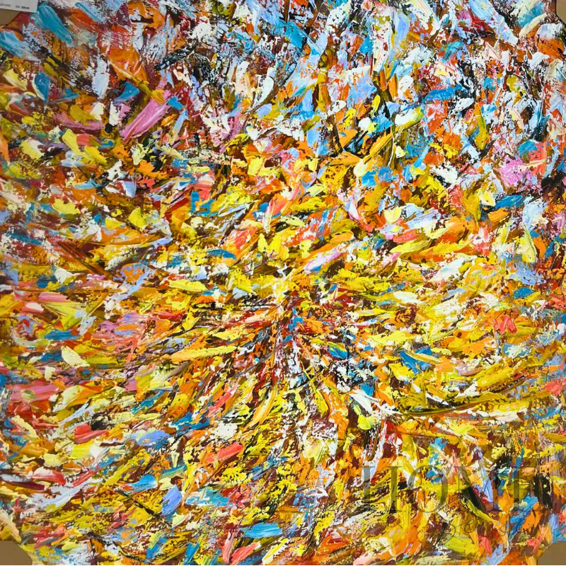 Close-up of vibrant yellow orange blue and pink abstract brushstrokes
