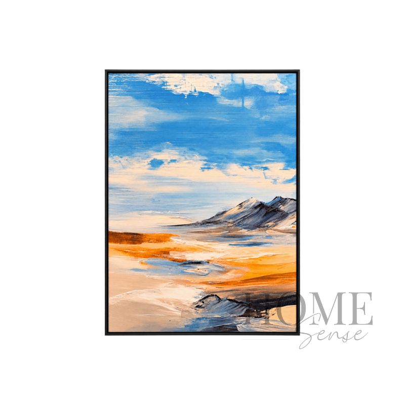 First Light on the Peaks portrait landscape fine art print featuring a soft blue sky, distant grey mountains and golden ochre land in a black aluminium frame, 70x90cm