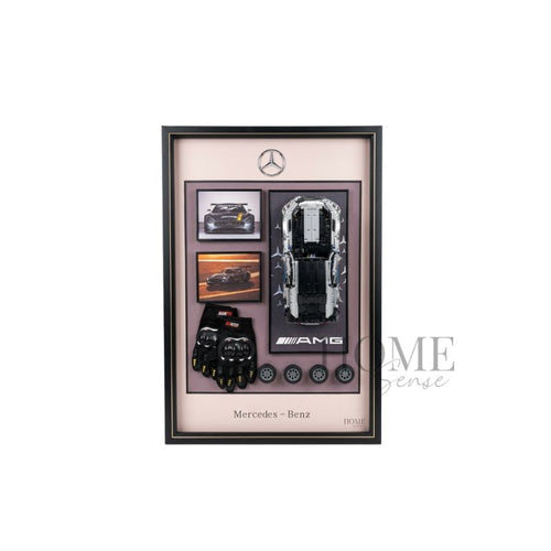 Mercedes-Benz-inspired 3D automotive wall art with a model racing car, gloves and miniature wheels in a black aluminium frame, 60x90cm