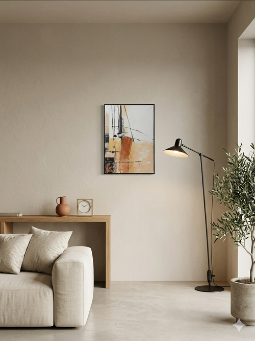 Modern living room with a beige sofa, wooden side table, abstract painting, and floor lamp.